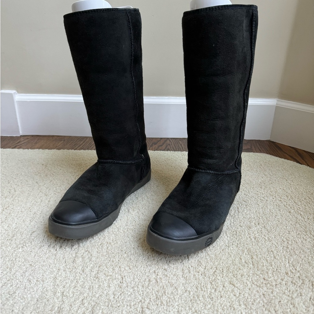 UGGS Lined black shearling.  Cozy! Rubber toe.